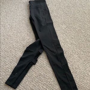 Athleta tights with mesh side panels